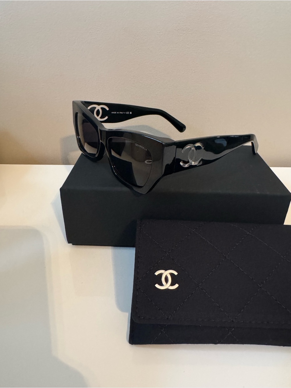 CHANEL Glossy Black Cat-Eye Sunglasses with Silver CC Accents, CH5527